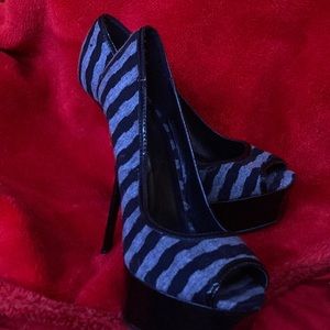 Joey 0.  size 8. Striped  heels .